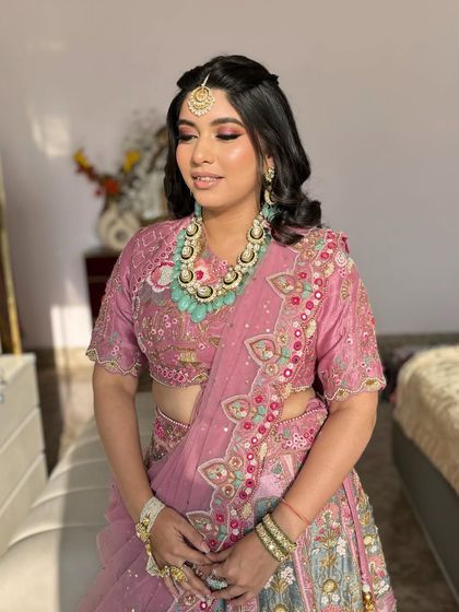 The complete look, with beautiful turquoise jewelry that provides a stunning contrast to the pink outfit.