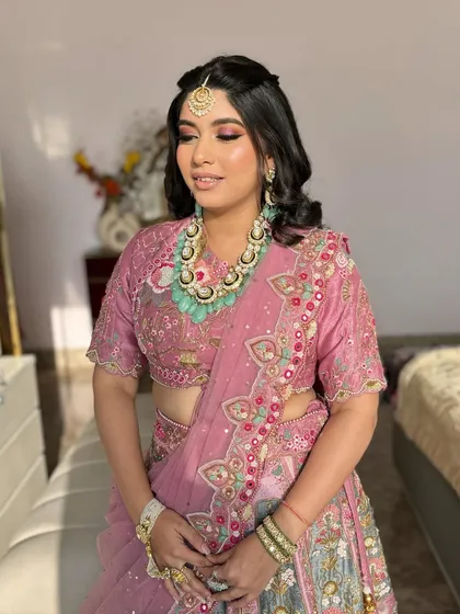 The complete look, with beautiful turquoise jewelry that provides a stunning contrast to the pink outfit.