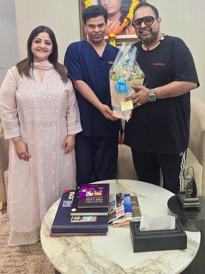 Presenting a bouquet to Shankar Mahadevan ji and his wife. I am deeply grateful for their friendship and the divine grace they bring into our lives.