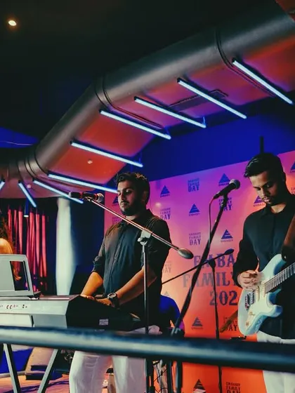 Another angle from our performance for Embassy, showing our keyboardist and guitarist in action. Every member of our 7-piece band contributes to our full and layered sound.