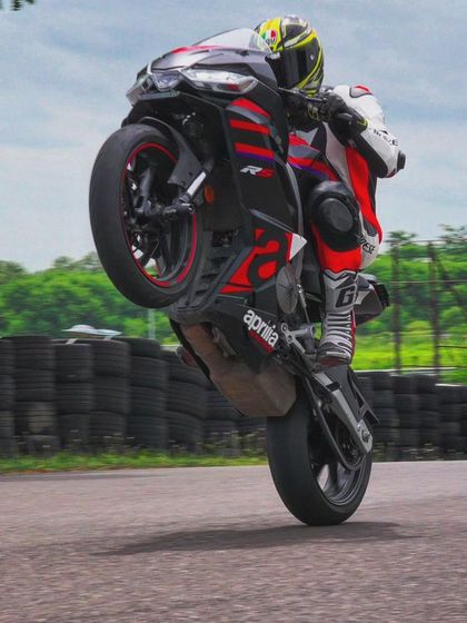 It's not all about lap times. Sometimes you just have to have some fun, like popping a wheelie on the straight. It's all part of the track day experience.