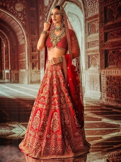 Bridal photography is about capturing timeless grace. In my workshops, we explore how to use lighting and projected backdrops to create regal, intricate portraits like this, ensuring every detail of the attire and the moment is preserved beautifully.