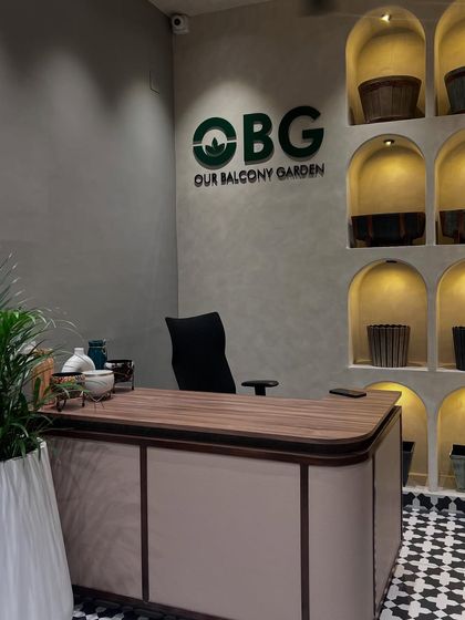 Our new store in Surathkal. We designed the space to be welcoming, with our OBG logo on the wall and a beautiful display of our planters.