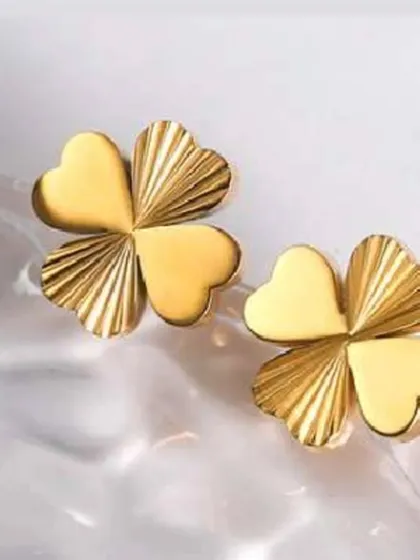 A close-up of my popular four-leaf clover stud earrings. The design features a mix of smooth and textured finishes, creating a unique look from durable, tarnish-resistant stainless steel.