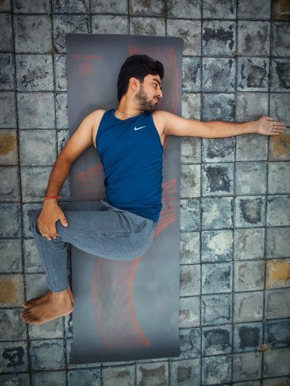 Jathara Parivartanasana, or the Abdominal Twisting Pose, is excellent for making the spine flexible. This gentle twist also tones the abdominal organs and can relieve sprains in the lower back.