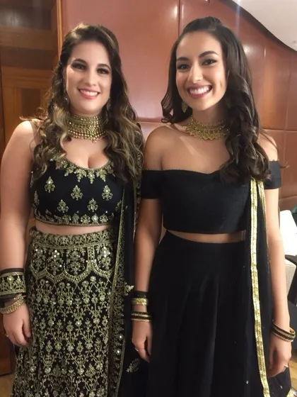 Getting these lovely clients ready for a wedding celebration. I created coordinated but distinct looks for them, ensuring their makeup and hair complemented their individual styles and outfits.
