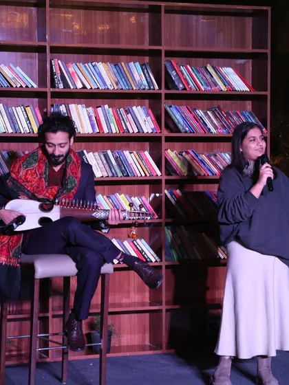 Our showcases often blend poetry with other art forms. This performance features a poet accompanied by a talented sarod player, creating a unique fusion of words and music that makes for an unforgettable evening.