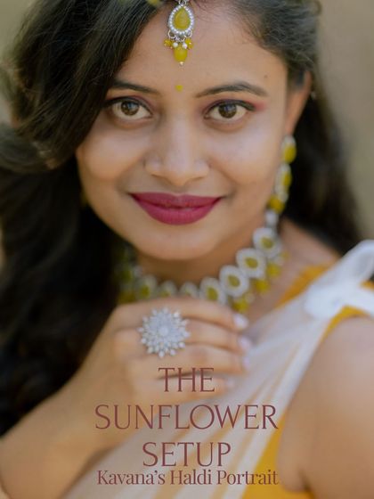 A close-up portrait of a bride from her Haldi ceremony, highlighting her beautiful makeup and sunflower-themed jewelry.