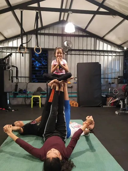 A three-person pyramid that combines basing, flying, and balancing. These human pyramids are a great way to build trust and communication within the group.