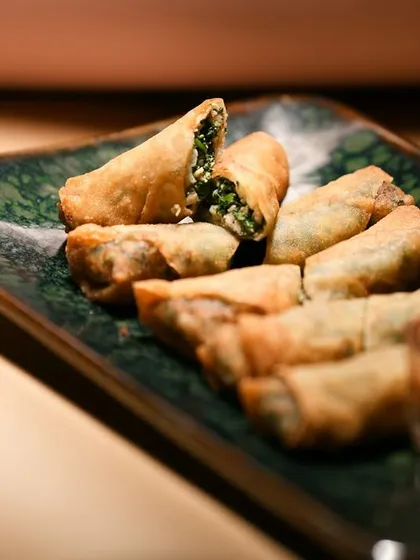 Another shot of the Chicken & Spinach Cheese Cigars, highlighting the flaky, crispy texture of the pastry.