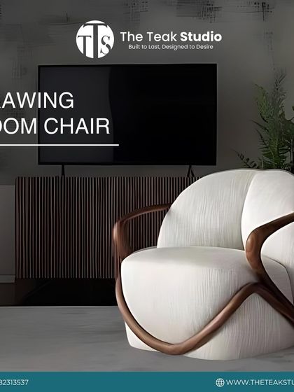 A showcase of our popular drawing room chair, featuring a sculptural wooden frame that wraps around the upholstered body. This design is a bestseller because it perfectly balances artistic form with ergonomic comfort.