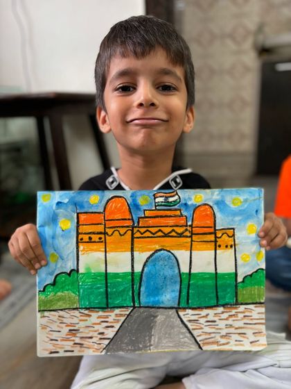 A senior KG student's creative depiction of India Gate for Independence Day, with the monument coloured in the shades of the flag.