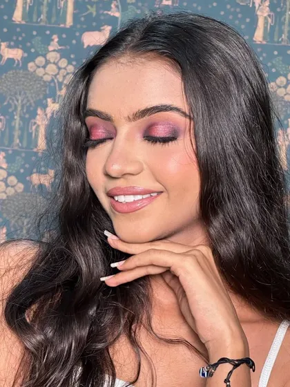 With eyes closed, you can really appreciate the blend of the purple and pink eyeshadows in this halo eye look. Seamless blending is a skill I emphasize in all my classes.