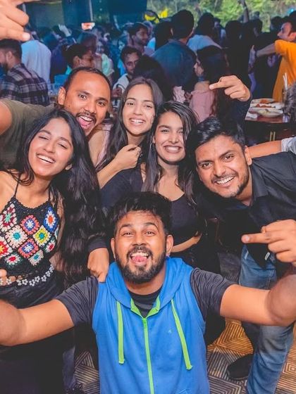 A big group of friends having an amazing time. Boomrang is a great place to celebrate with your crew.