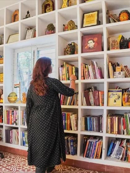 A home should be a reflection of your passions. For my client, a professor, a library was essential. I designed this floor-to-ceiling bookshelf at the Raghavendra Residence to be both a functional storage solution and a beautiful feature wall, creating a dedicated space for knowledge and inspiration.