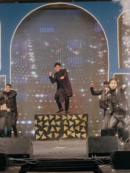 The groom's solo performance was pure fire. With his squad backing him up and cold pyros blasting, this high-impact entry got the entire audience hyped up.
