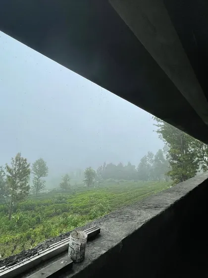 A view from our 'Panorama' project in Ooty, where the architecture is designed to frame the natural landscape. We create spaces that connect guests with their environment, making the view an integral part of the interior experience.