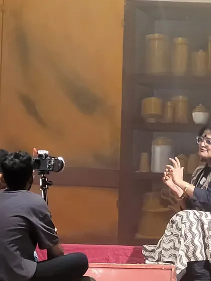 Explaining the concept behind "Songs of the Millstone" during a pre-production interview. My workshops often lead to full-fledged stage productions.