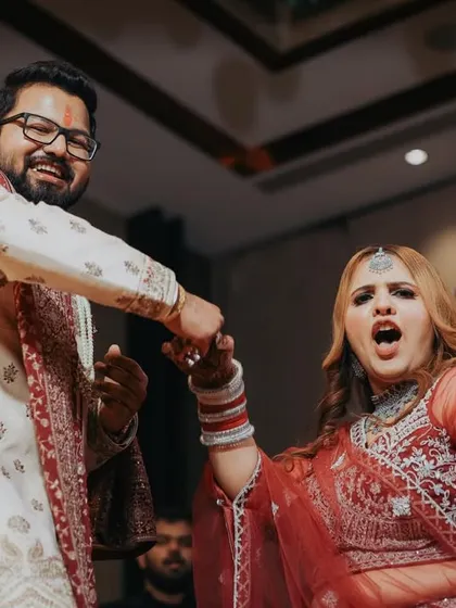 The couple celebrating on the dance floor. Capturing the movement and energy of the party is a key part of my event coverage.