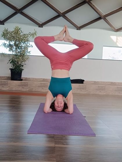 A guest performs a supported headstand variation. Yoga is a journey of transformation, and we are here to support you at every stage, from beginner to advanced practitioner.