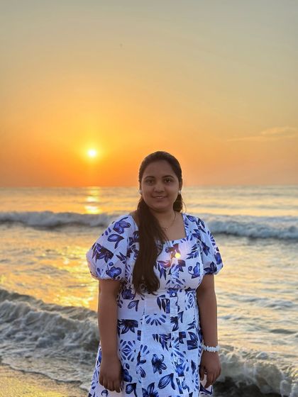A beautiful portrait of a trekker enjoying the golden hour at a Pondicherry beach.
