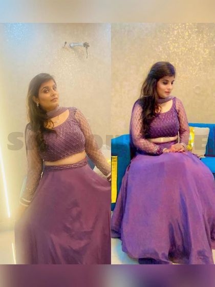 A client looking beautiful in a simple yet elegant purple crop top and skirt set. The sheer embroidered sleeves add a delicate touch.