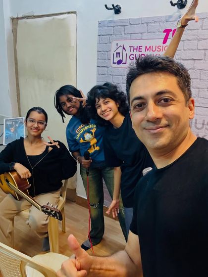 Our founder with the student band after a successful practice session. We are proud to support our rockstars every step of the way.