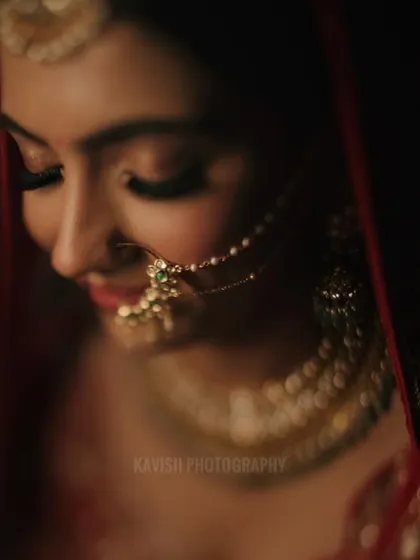 A soft-focus, artistic bridal portrait capturing a quiet, contemplative moment.