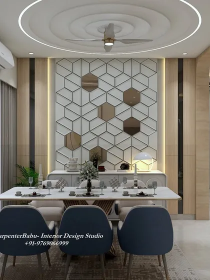 A front view of the dining table set against the geometric mirror wall. The design is bold, modern, and perfect for making a statement.