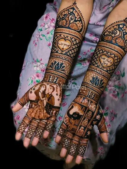 "We Said Yes!" This engagement mehndi celebrates the couple's commitment with a beautiful portrait, surrounded by hearts, lotus flowers, and peacock motifs.