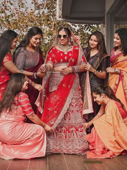 The bride squad on duty. We love capturing these fun moments. Our bride stands out, looking radiant and sassy amongst her friends.