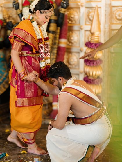 A beautiful moment from the ceremony, capturing the blend of tradition, emotion, and her flawless bridal look.