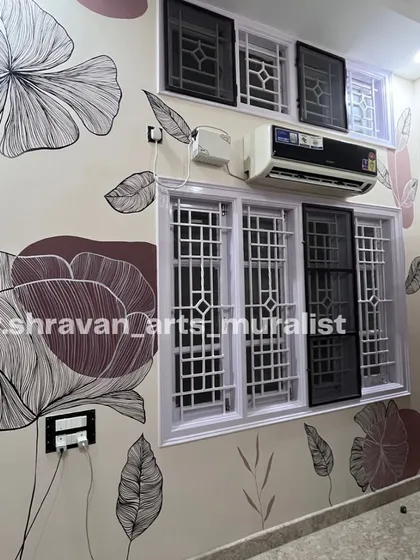 A quick but detailed bohemian foliage mural designed around a window. The fine line work on the flowers and leaves adds a delicate and intricate touch.