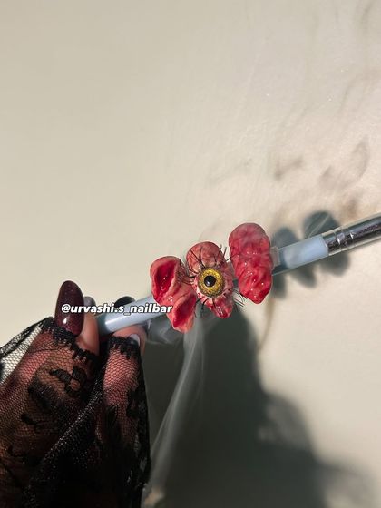 For those who love spooky season, this 3D horror set is a showstopper. I sculpted a realistic eyeball with lashes, brains, and bloody textures to create a truly unique and creepy Halloween look.