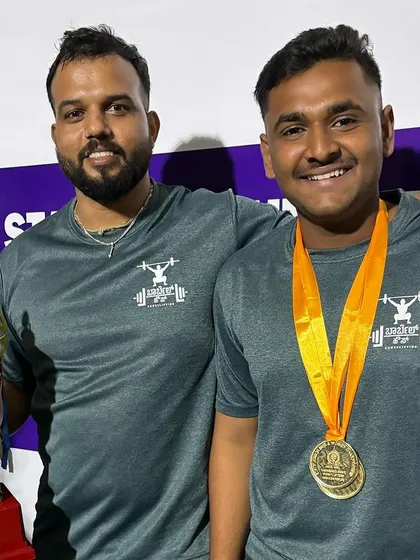 Celebrating a gold medal win with a member of Team Barbellhouse. His hard work and commitment to the training program delivered outstanding results.