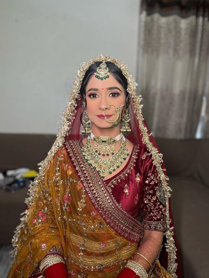 My beautiful bride Sarab, who came all the way from Canada. We created a stunning look with a maroon velvet blouse and a mustard yellow dupatta.