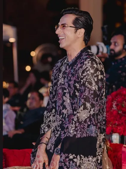 The groom's infectious smile as he enjoys the Sangeet night. We handle the stress so you can have all the fun.