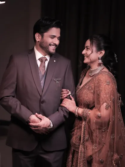 A sweet, candid moment between the couple, their happy expressions telling a story of love and companionship.