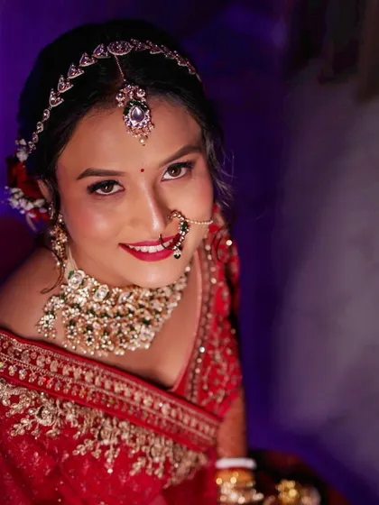 A happy, smiling portrait of the bride, looking up with joy and anticipation.