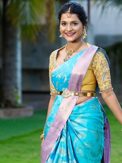 Kavya's radiant smile says it all. Our silk saree, with its rich texture and beautiful sheen, was chosen to make her feel special as she celebrates her engagement with family and friends.