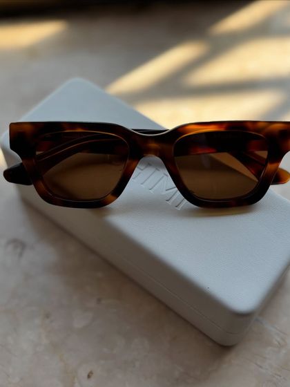 A close-up of these amazing sunglasses I picked up in New York. A great pair of sunnies is one of the easiest ways to elevate a look.