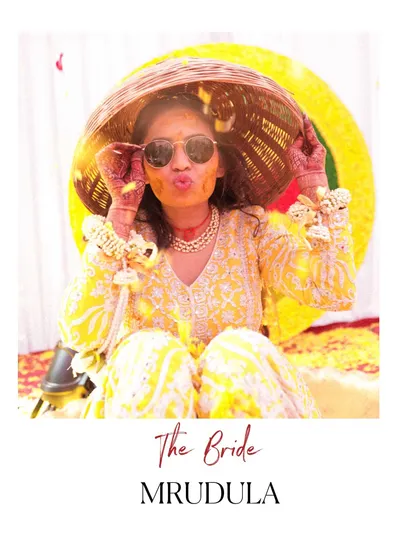 "The Bride." A cool, fun portrait of the bride during her Haldi, using a traditional basket as a prop. We love getting creative with our shots.
