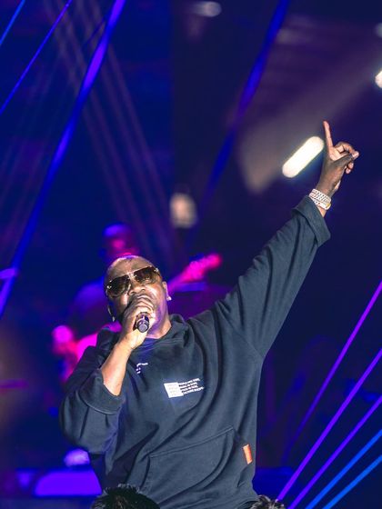 Akon owning the stage, a masterclass in performance. We manage tours for international artists, handling all Indian logistics and production.