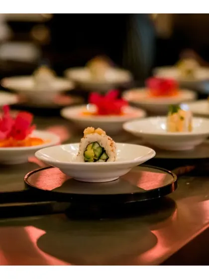 A close-up of our sushi conveyor belt, a modern and engaging way to serve a variety of sushi at any event.