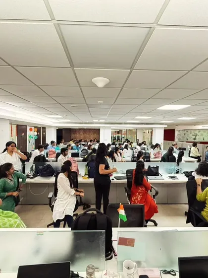 Yoga isn't just for the studio. Here I am leading a corporate yoga session, bringing simple, effective techniques for stress relief and mental clarity right into the workplace.