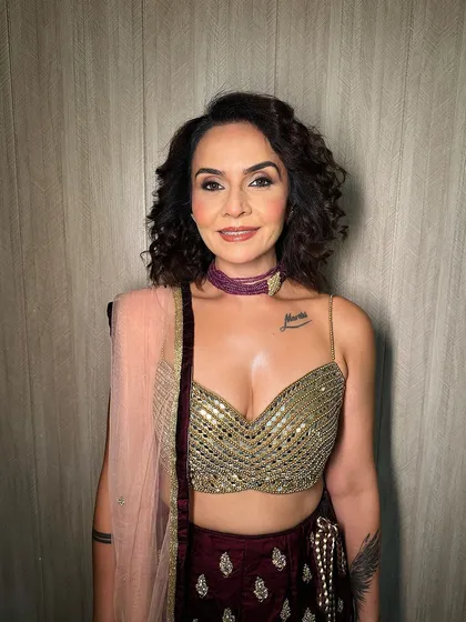 A happy and confident wedding guest. The makeup is designed to last all night while feeling comfortable and looking flawless in photos.