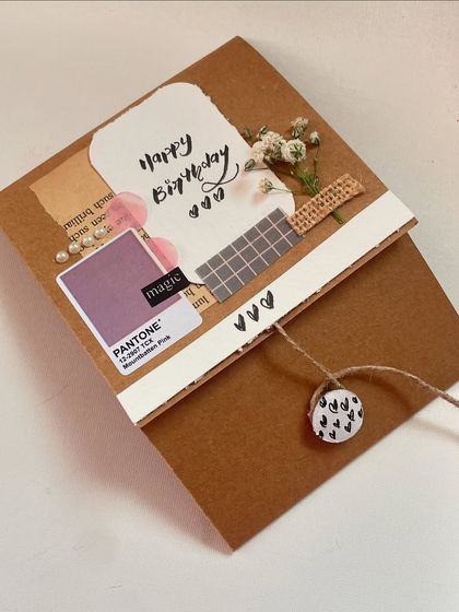 A custom "Happy Birthday" card with a collage of different papers, colors, and textures. I love playing with layers to create something unique.