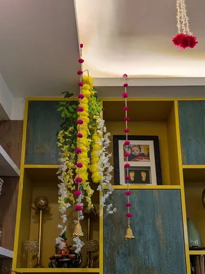 For this home, I created custom floral hangings with bells to add a decorative touch to the living space. These can be customized in different colors and lengths.