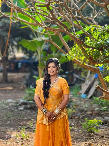 A lovely outdoor shot, with the natural light making her skin glow.