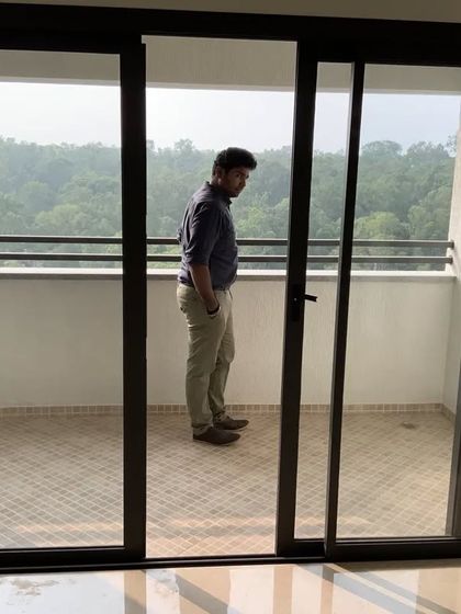 Checking the functionality and finish of sliding balcony doors. Our architect's professional report safeguards the client's investment.